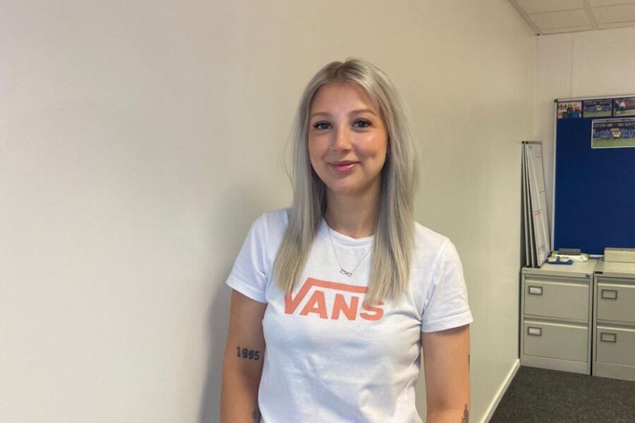 Tempany smiling wearing a Vans t-shirt